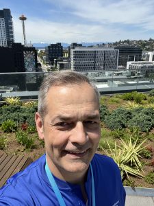 Jerry Litzo takes a selfie in front of the Space Needle.